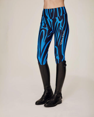 Full-length product shot of the blue zebra riding tights, showcasing the bold pattern and athletic silhouette.