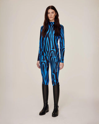 Side-angle full body shot of the model wearing the complete blue zebra riding outfit for maximum support and style.