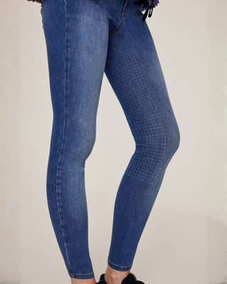 Side view product shot of Riders Denim original jeans breeches highlighting the fit and denim fabric.